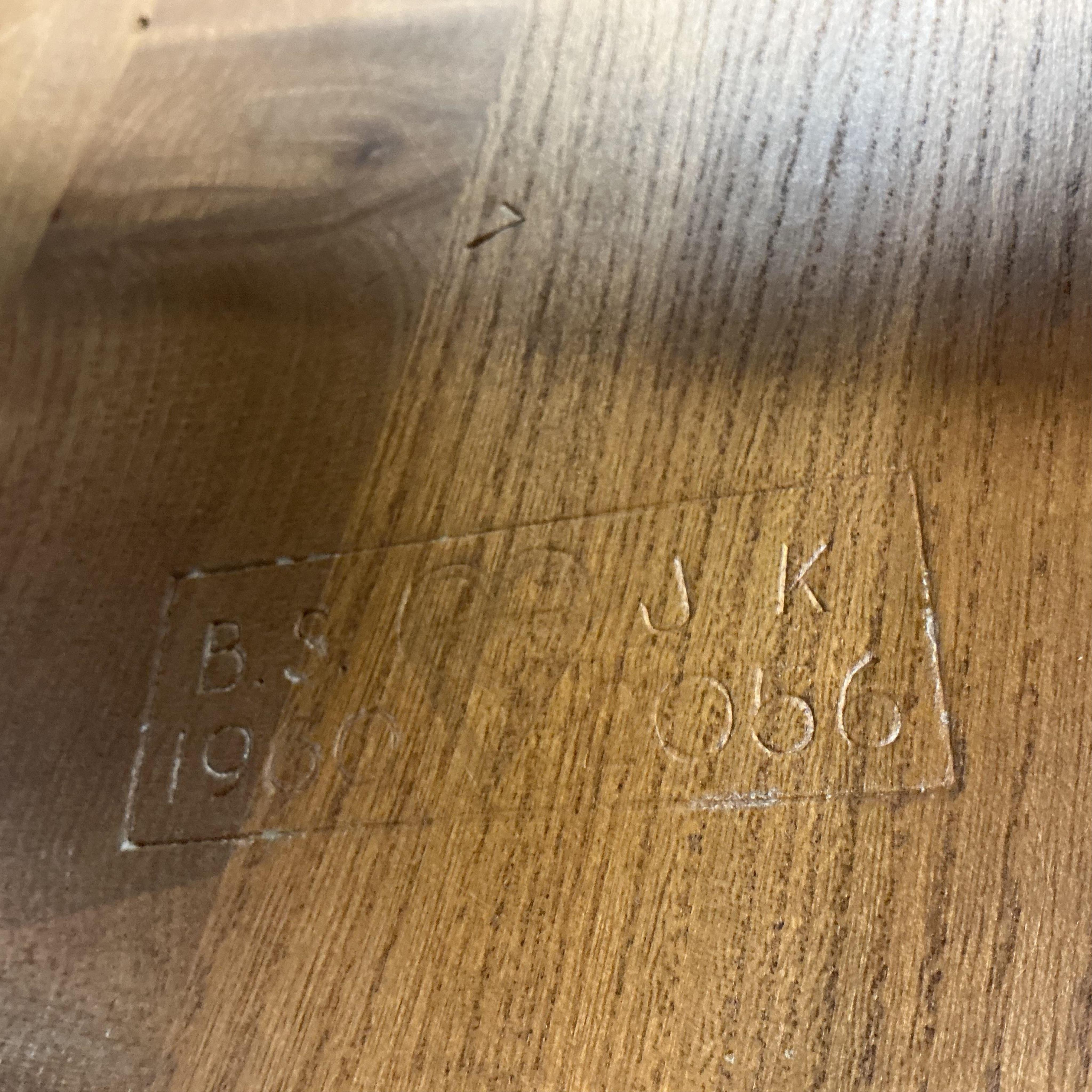 A mid century teak four drawer chest, width 124cm, depth 42cm, height 66cm